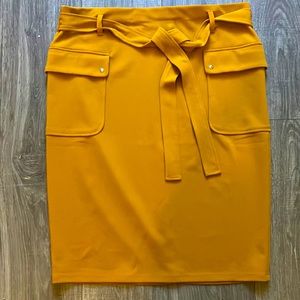 Brand new, never worn, NYCC yellow skirt